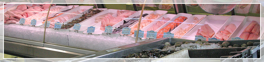 seafood counter with large amounts of fish and seafood