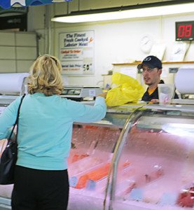 fresh sport fish at fish market counter