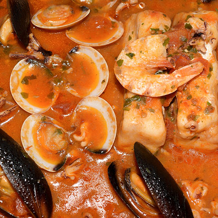 fish stew with clams, shrimp, and cod