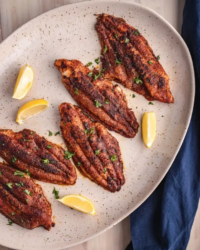 City Fish Market fresh catfish fillets, blackened in a hot skillet with Cajun seasoning and finished with garlic-lemon butter. An easy 20-minute dinner with a bold crust and plenty of flavor.