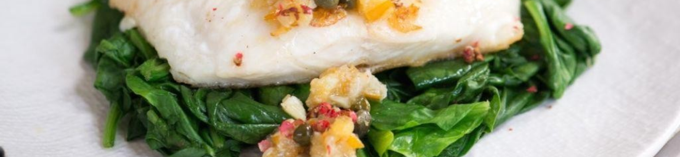 City Fish Market haddock filets, pan-seared until golden and topped with a bright lemon caper butter sauce.