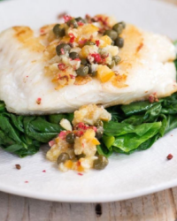City Fish Market haddock filets, pan-seared until golden and topped with a bright lemon caper butter sauce.